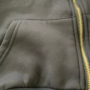 Never worn NWOT cropped navy blue hoodie in size small.